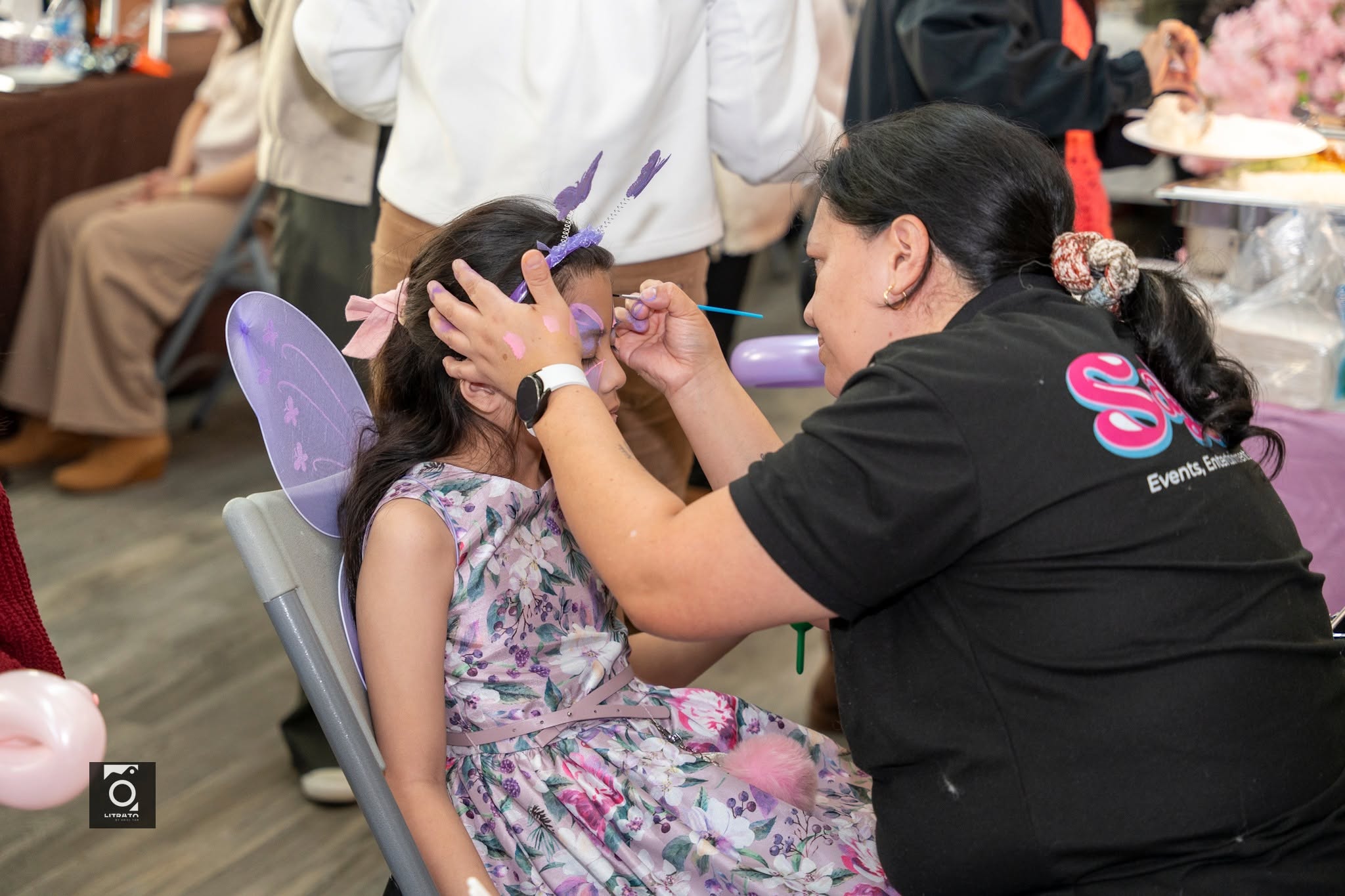 Face painting at a school or daycare event
