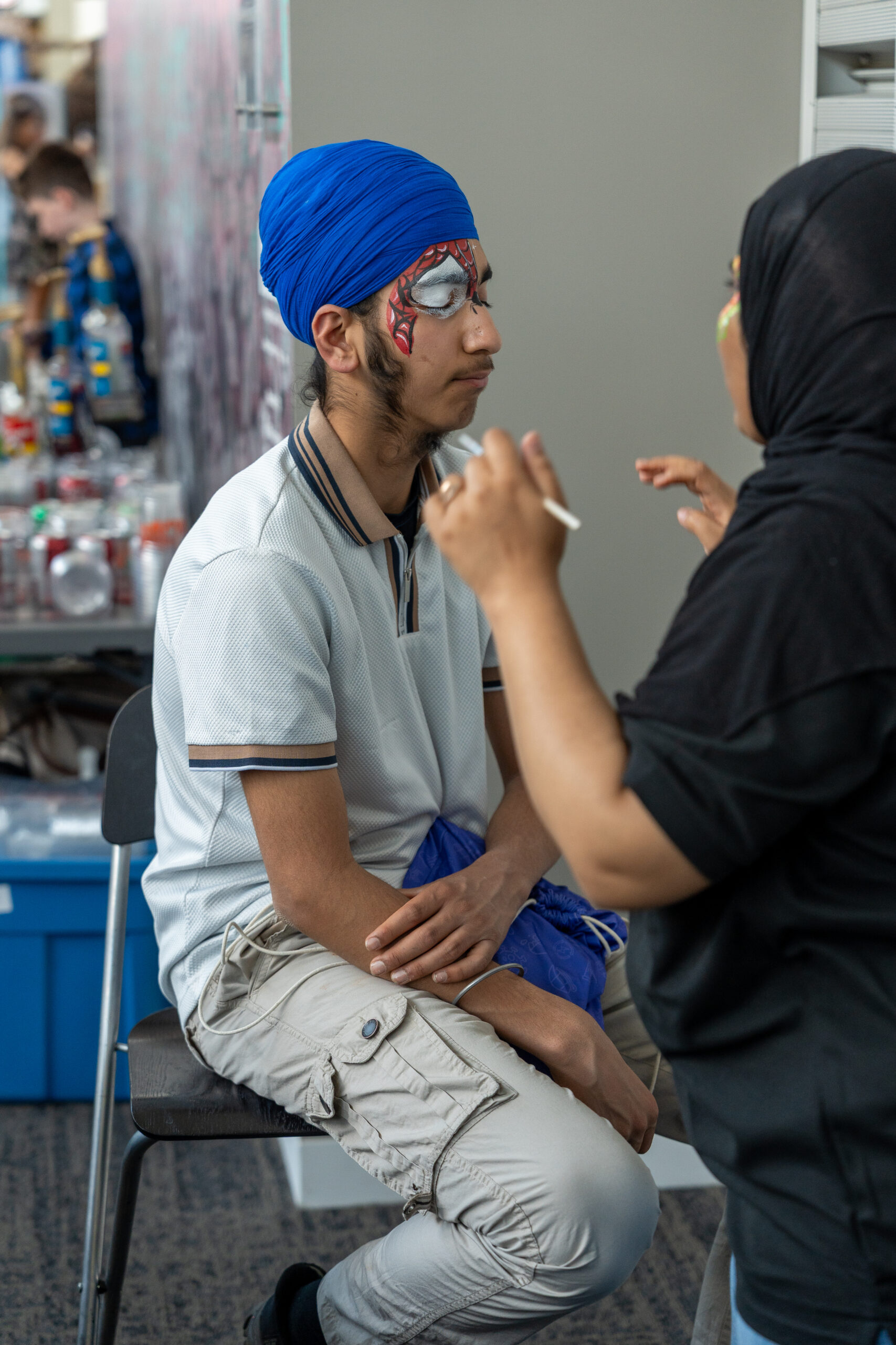 Face painting for adults at a public event